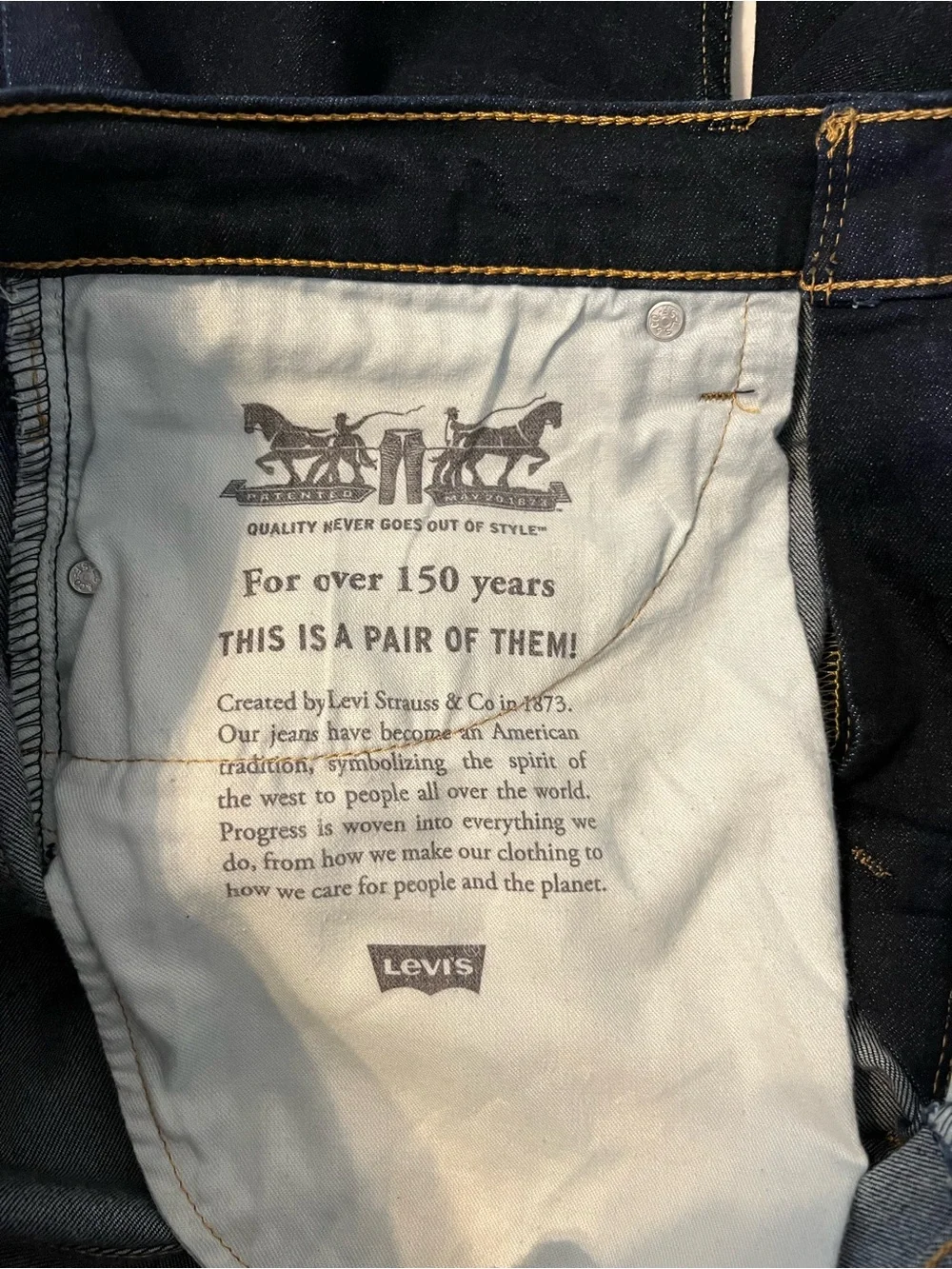 Levi's Men's Jeans in Dark Indigo with Tan Patch